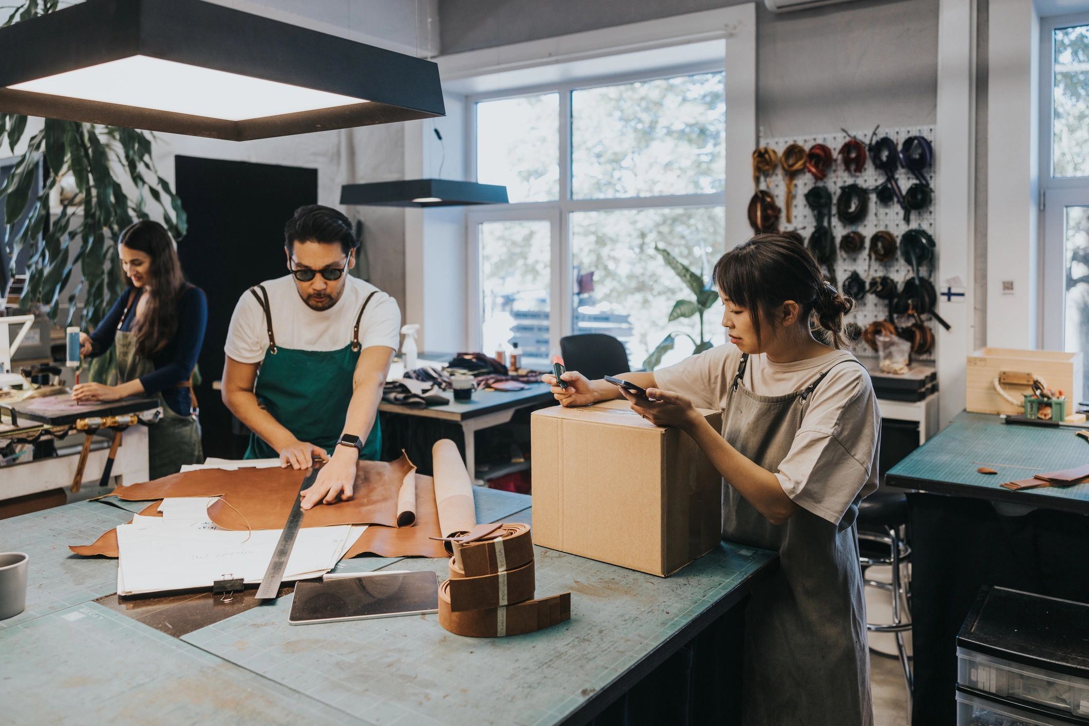 Small business owner preparing a package for shipping
